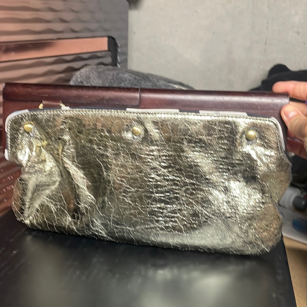 Wooden handle clutch purse